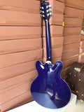 left handed purple jazz 335 electric guitar Grote flame maple guitar
